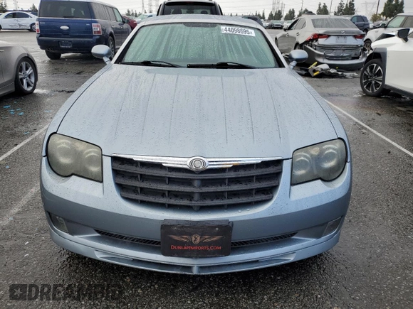 2005 Chrysler Crossfire z VIN 1C3AN79N35X039973, wystawiony jako Copart lot #44098695 z przebiegiem 109 161 mil mil oraz Czysty tytuł • Clean title. Historia ofert i sprzedaży dostępna na DreamBid. Obrazek 5.