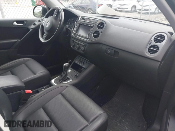 2017 Volkswagen Tiguan Wolfsburg Edition with VIN WVGSV7AX3HK037795, listed as a IAAI auction lot 42497812 with 86,211 mi miles and . Bid and sale history available at DreamBid. Image 5.