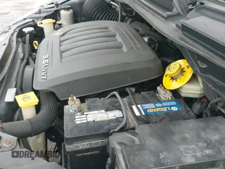 2013 Dodge Grand Caravan American Value with VIN 2C4RDGBG0DR807449, listed as a IAAI auction lot 43262185 with 137,280 mi miles and . Bid and sale history available at DreamBid. Image 14.