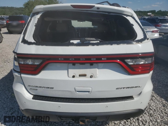 2014 Dodge Durango Citadel with VIN 1C4RDJEG0EC585921, listed as a Copart auction lot 58242625 with 192,904 mi miles and Salvage title. Bid and sale history available at DreamBid. Image 6.