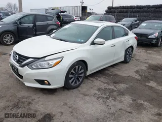 2016 Nissan Altima 2.5 S with VIN 1N4AL3AP0GC272815, listed as a IAAI auction lot 41547789 with 124,313 mi miles. Bid and sale history available at carsss.com. Image 17.