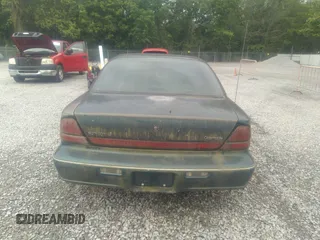 1998 Oldsmobile 88 LS z VIN 1G3HN52K5W4849011, wystawiony jako IAAI lot #42153650 z przebiegiem 171 969 mil mil oraz . Historia ofert i sprzedaży dostępna na DreamBid. Obrazek 16.