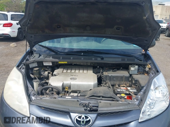 2007 Toyota Sienna CE with VIN 5TDZK23C77S030350, listed as a IAAI auction lot 42231747 with 218,321 mi miles and . Bid and sale history available at carsss.com. Image 10.