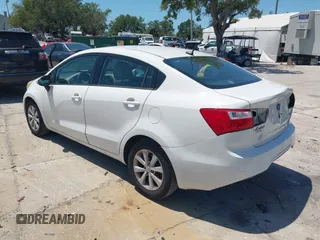 2013 Kia Rio SX with VIN KNADN4A33D6174454, listed as a IAAI auction lot 42032612 with 157,199 mi miles. Bid and sale history available at carsss.com. Image 3.