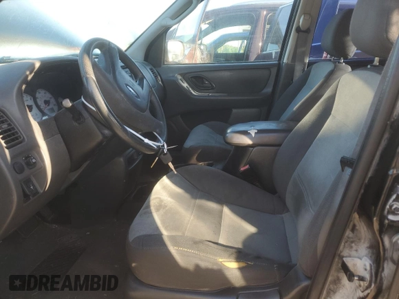 2004 Ford Escape XLS with VIN 1FMYU921X4KA14947, listed as a Copart auction lot 71589544 with 173,890 mi miles and Salvage Title. Bid and sale history available at DreamBid. Image 7.