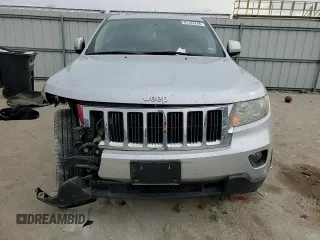 2011 Jeep Grand Cherokee 70th Anniversary with VIN 1J4RR4GT0BC666579, listed as a Copart auction lot 87322784 with 163,439 mi miles and Salvage Title. Bid and sale history available at carsss.com. Image 12.
