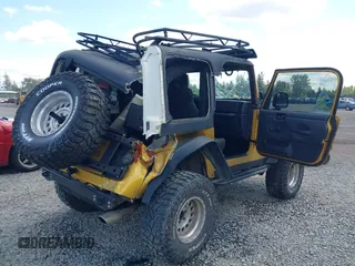 2003 Jeep Wrangler Rubicon with VIN 1J4FA69S93P302102, listed as a IAAI auction lot 42312951 with 146,408 mi miles and . Bid and sale history available at DreamBid. Image 4.