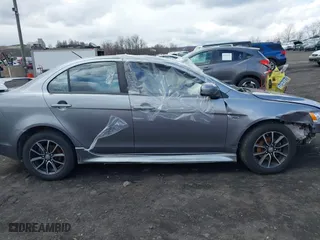 2017 Mitsubishi Lancer ES with VIN JA32U2FU7HU000552, listed as a IAAI auction lot 41868342 with 136,132 mi miles. Bid and sale history available at carsss.com. Image 13.