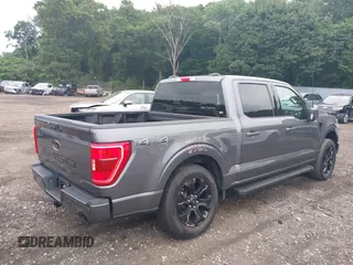 2023 Ford F-150 XL with VIN 1FTFW1ED4PFB18358, listed as a IAAI auction lot 39921708 with 9,013 mi miles. Bid and sale history available at carsss.com. Image 4.
