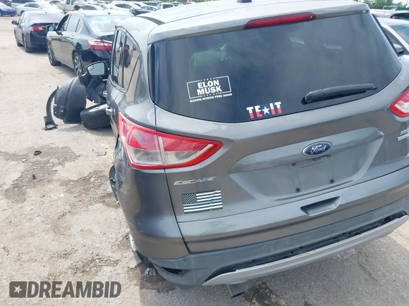 2014 Ford Escape SE z VIN 1FMCU9GX9EUC01478, wystawiony jako IAAI lot #42370409 z przebiegiem 158 154 mil mil oraz . Historia ofert i sprzedaży dostępna na DreamBid. Obrazek 3.