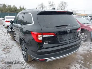 2021 Honda Pilot Touring 8-Passenger z VIN 5FNYF6H94MB091384, wystawiony jako IAAI lot #41567070 z przebiegiem 78 330 mil mil oraz . Historia ofert i sprzedaży dostępna na DreamBid. Obrazek 3.