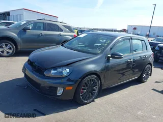 2014 Volkswagen GTI Driver's Edition with VIN WVWHD7AJ8EW003725, listed as a IAAI auction lot 41772639 with 131,500 mi miles. Bid and sale history available at carsss.com. Image 2.