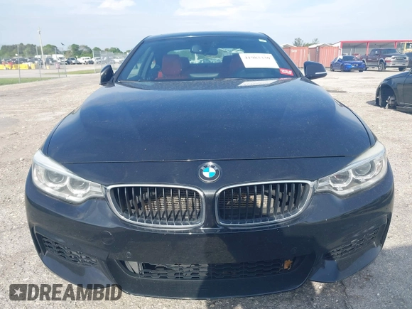 2015 BMW 4 Series 428i with VIN WBA3N3C56FK233866, listed as a IAAI auction lot 41983330 with 218,017 mi miles and . Bid and sale history available at DreamBid. Image 6.