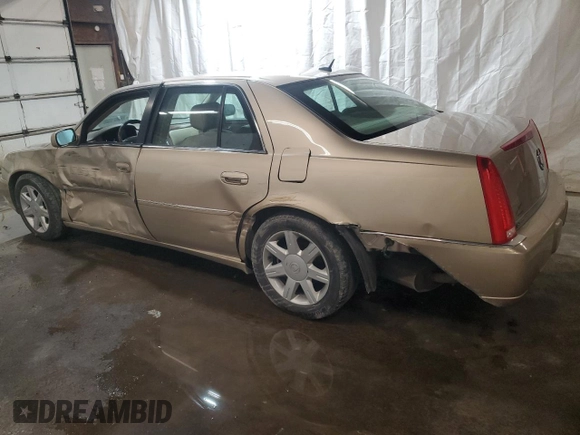 2006 Cadillac DTS 1SC z VIN 1G6KD57Y76U141402, wystawiony jako Copart lot #58715675 z przebiegiem 148 042 mil mil oraz Szkoda całkowita • Salvage title. Historia ofert i sprzedaży dostępna na DreamBid. Obrazek 2.