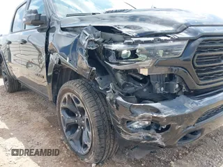 2023 Ram 1500 Limited with VIN 1C6SRFHT6PN541655, listed as a IAAI auction lot 42143725 with 52,793 mi miles and . Bid and sale history available at DreamBid. Image 6.
