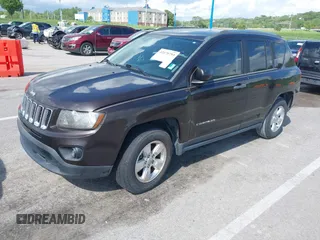 2014 Jeep Compass Sport with VIN 1C4NJCBA4ED626998, listed as a IAAI auction lot 42179793 with 109,059 mi miles. Bid and sale history available at carsss.com. Image 2.
