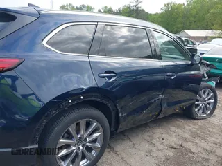2021 Mazda CX-9 Carbon Edition with VIN JM3TCADY1M0516505, listed as a IAAI auction lot 42016644 with 50,900 mi miles and . Bid and sale history available at carsss.com. Image 6.
