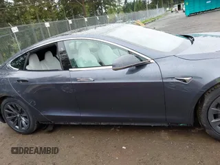 2017 Tesla Model S 100D with VIN 5YJSA1E26HF224568, listed as a IAAI auction lot 42140201 with 102,403 mi miles. Bid and sale history available at carsss.com. Image 14.