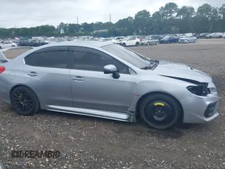 2020 Subaru WRX STI Limited with VIN JF1VA2Y6XL9806022, listed as a IAAI auction lot 39980273 with 143,889 mi miles. Bid and sale history available at carsss.com. Image 13.