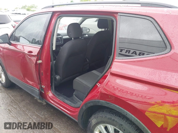 2018 Volkswagen Tiguan S with VIN 3VV0B7AX3JM095118, listed as a IAAI auction lot 42319834 with 100,759 mi miles and . Bid and sale history available at DreamBid. Image 6.