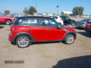 2013 MINI Countryman S z VIN WMWZC3C52DWP23887, wystawiony jako IAAI lot #42278143 z przebiegiem 63 625 mil mil oraz . Historia ofert i sprzedaży dostępna na DreamBid. Obrazek 13.