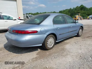 1998 Mercury Sable GS with VIN 1MEFM50U3WG643083, listed as a IAAI auction lot 42481534 with 115,146 mi miles and . Bid and sale history available at DreamBid. Image 4.