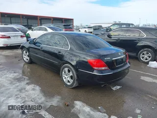 2008 Acura RL Tech Pkg with VIN JH4KB16608C001517, listed as a IAAI auction lot 41305313 with 220,509 mi miles. Bid and sale history available at carsss.com. Image 3.