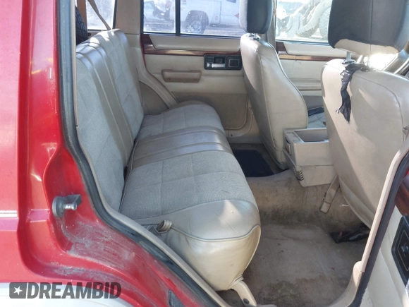 1996 Jeep Cherokee Country with VIN 1J4FJ78S1TL245327, listed as a IAAI auction lot 41443781 with 245,889 mi miles. Bid and sale history available at carsss.com. Image 8.