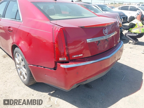 2008 Cadillac CTS RWD w/1SB with VIN 1G6DV57V980213836, listed as a IAAI auction lot 42006005 with 124,596 mi miles. Bid and sale history available at carsss.com. Image 12.