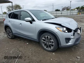 2016 Mazda CX-5 Grand Touring with VIN JM3KE2DY2G0894056, listed as a Copart auction lot 49247815 with 56,039 mi miles and Salvage Title. Bid and sale history available at carsss.com. Image 4.