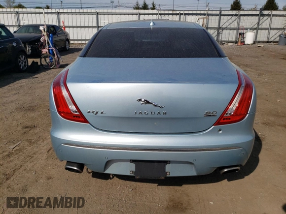 2013 Jaguar XJ Portfolio with VIN SAJWJ2GD3D8V47879, listed as a Copart auction lot 54558195 with 99,500 mi miles and Clean Title. Bid and sale history available at DreamBid. Image 6.