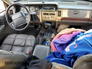 1995 Jeep Grand Cherokee Limited with VIN 1J4GZ78Y2SC603292, listed as a Copart auction lot 84449764 with 153,673 mi miles and Non Repairable. Bid and sale history available at carsss.com. Image 8.