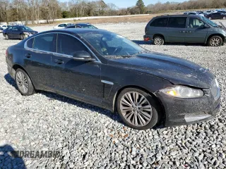 2012 Jaguar XF Portfolio with VIN SAJWA0HBXCLS52419, listed as a Copart auction lot 41492245 with 188,378 mi miles and Salvage Title. Bid and sale history available at carsss.com. Image 4.