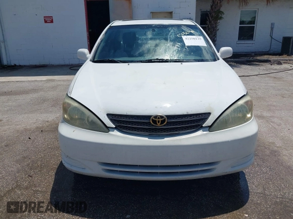2002 Toyota Camry XLE z VIN 4T1BF32K42U035090, wystawiony jako IAAI lot #42250135 z przebiegiem 176 364 mil mil oraz . Historia ofert i sprzedaży dostępna na DreamBid. Obrazek 6.