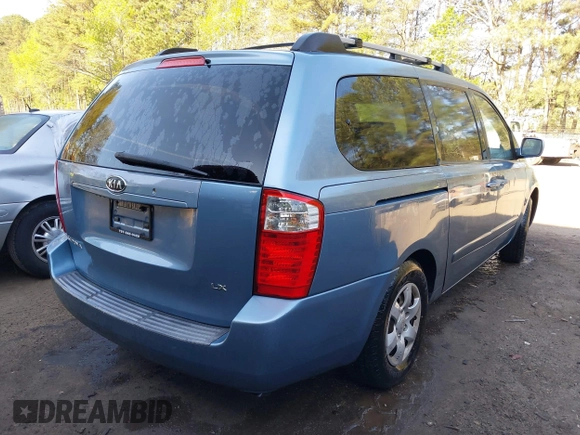 2007 Kia Sedona EX with VIN KNDMB233376173452, listed as a IAAI auction lot 41994451 with 201,849 mi miles. Bid and sale history available at carsss.com. Image 4.
