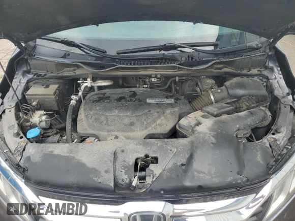 2018 Honda Odyssey with VIN 5FNRL6H49JB504977, listed as a Copart auction lot 60905615 with 180,464 mi miles and Clean title. Bid and sale history available at DreamBid. Image 12.