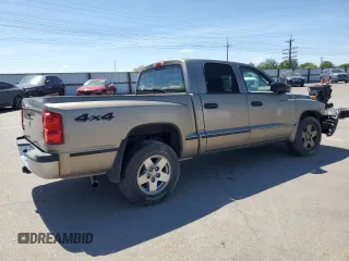 2006 Dodge Dakota SLT z VIN 1D7HW48NX6S709353, wystawiony jako Copart lot #58043225 z przebiegiem 222 008 mil mil oraz Szkoda całkowita • Salvage title. Historia ofert i sprzedaży dostępna na DreamBid. Obrazek 3.