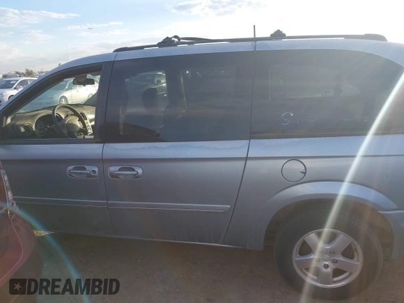 2005 Dodge Caravan SXT with VIN 2D4GP44L55R483006, listed as a IAAI auction lot 42636765 with 307,331 mi miles and . Bid and sale history available at DreamBid. Image 14.