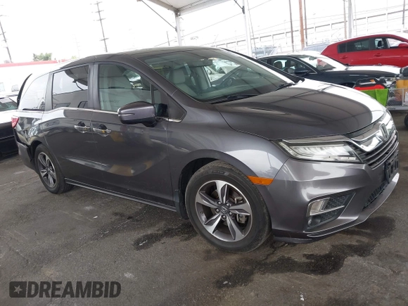 2019 Honda Odyssey Touring z VIN 5FNRL6H88KB037149, wystawiony jako IAAI lot #42356871 z przebiegiem 64 549 mil mil oraz . Historia ofert i sprzedaży dostępna na DreamBid. Obrazek 1.
