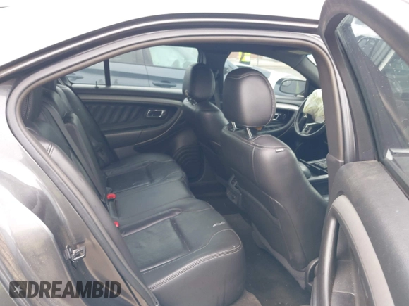 2015 Ford Taurus SEL with VIN 1FAHP2E81FG163058, listed as a IAAI auction lot 42221098 with 127,957 mi miles and . Bid and sale history available at carsss.com. Image 8.