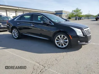 2014 Cadillac XTS z VIN 2G61L5S39E9298743, wystawiony jako Copart lot #53640375 z przebiegiem 77 382 mil mil oraz Szkody całkowita. Historia ofert i sprzedaży dostępna na DreamBid. Obrazek 4.