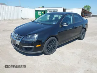 2008 Volkswagen Jetta Sedan Wolfsburg with VIN 3VWRJ71K08M175125, listed as a IAAI auction lot 42087215 with 150,813 mi miles. Bid and sale history available at carsss.com. Image 2.