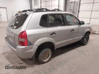 2006 Hyundai Tucson GL with VIN KM8JM12BX6U250937, listed as a IAAI auction lot 41529567 with 165,528 mi miles. Bid and sale history available at carsss.com. Image 4.