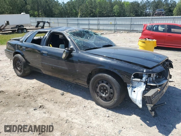 2011 Ford Police Interceptor with VIN 2FABP7BV2BX105686, listed as a Copart auction lot 54908935 with Not provided miles and Salvage title. Bid and sale history available at DreamBid. Image 4.
