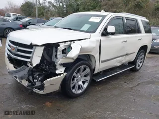 2015 Cadillac Escalade Premium with VIN 1GYS4NKJ9FR547587, listed as a IAAI auction lot 41556378 with 155,038 mi miles. Bid and sale history available at carsss.com. Image 2.