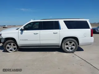 2016 Chevrolet Suburban LT with VIN 1GNSKHKC7GR172516, listed as a IAAI auction lot 41680550 with 237,270 mi miles. Bid and sale history available at carsss.com. Image 13.