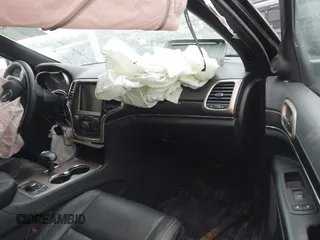 2014 Jeep Grand Cherokee Limited with VIN 1C4RJFBG2EC279944, listed as a IAAI auction lot 41591623 with 150,588 mi miles and . Bid and sale history available at DreamBid. Image 5.