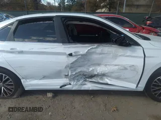 2021 Volkswagen Jetta S z VIN 3VWC57BU1MM017025, wystawiony jako IAAI lot #31656882 z przebiegiem 20 664 mil mil oraz . Historia ofert i sprzedaży dostępna na DreamBid. Obrazek 6.