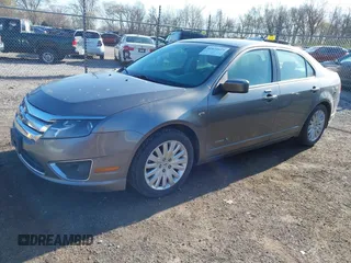 2010 Ford Fusion Hybrid z VIN 3FADP0L35AR423330, wystawiony jako IAAI lot #41972619 z przebiegiem 154 026 mil mil oraz . Historia ofert i sprzedaży dostępna na DreamBid. Obrazek 2.