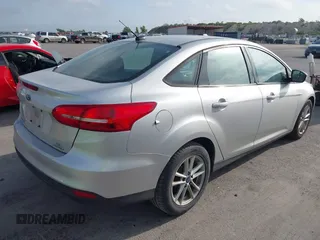 2015 Ford Focus SE with VIN 1FADP3F2XFL340583, listed as a IAAI auction lot 42099224 with 111,970 mi miles. Bid and sale history available at carsss.com. Image 4.